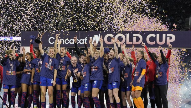 United States' Lindsey Horan holds the trophy alongside teammates after the United States defeated Brazil in the CONCACAF Gold Cup women's soccer tournament final match, Sunday, March 10, 2024, in San Diego.