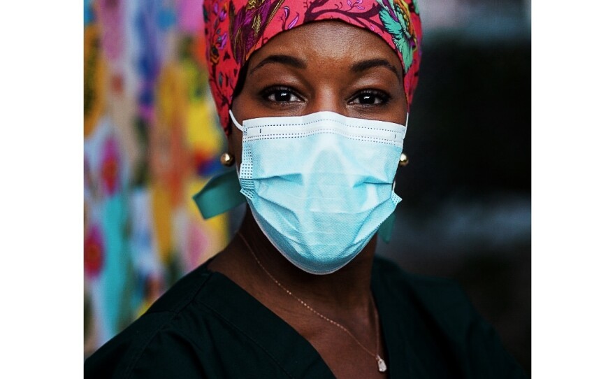 The photo from Karene Jean-Baptiste's project, Faces of Black Women in Health Care, is called Self-Portrait Done During The Pandemic.