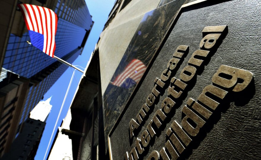 American International Group's headquarters on Pine Street in Manhattan. AIG is one of several huge firms that have received tens of billions of dollars in bailout money from the U.S. government — along with what amounts to future guarantees from Washington to keep them afloat if they run into trouble.