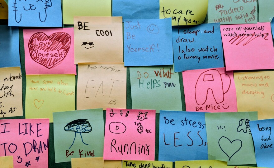 Students write positive messages in the wellness corner of Wangenheim Middle School in Mira Mesa, San Diego.