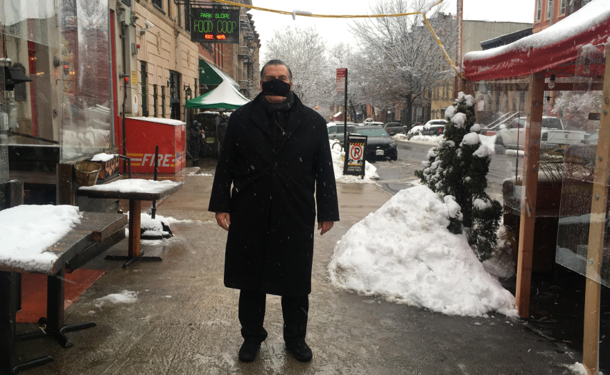 Owner Donald Minerva outside Scottadito Osteria Toscana restaurant in Brooklyn, N.Y., which has been closed for indoor dining for two months. The restaurant is reopening at reduced capacity on Valentine's weekend.