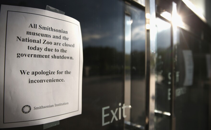 Shutdown signs have been posted at the National Museum of American History and other Smithsonian Institution museums, which will remain closed as long as the government is.