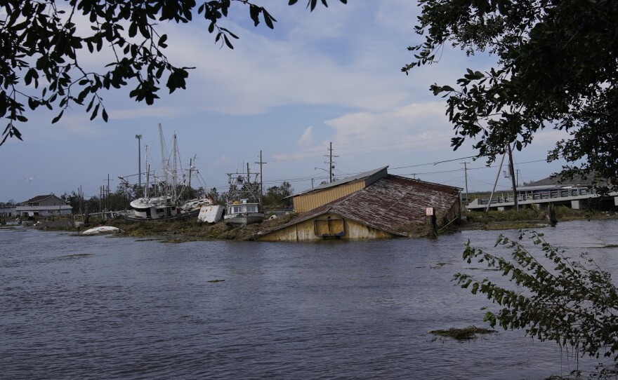 Flood damaged buildings and boats in the aftermath of Hurricane Ida, on Wednesday in Lafitte, La.