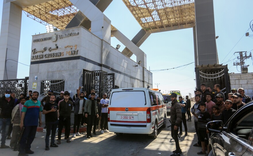 Bodies of employees of the aid organization World Central Kitchen who were killed in an Israeli attack on April 1 are taken from Al-Najjar hospital and sent by ambulances to Egypt through the Rafah border crossing in the Gaza Strip on April 3.