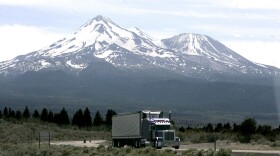 A truck drives past Mount Shasta near Weed, Calif., June 19, 2008. 