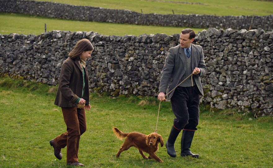 Jenny Alderson (Imogen Clawson), Scruff - Jenny’s dog - (Bobby) and James Herriot (Nicholas Ralph) in ALL CREATURES GREAT AND SMALL: Season 2 on MASTERPIECE.