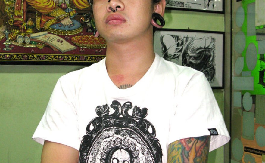 Pongsuk Tammaget, a tattoo artist in Bangkok's Khao San Road neighborhood, says he and other Thai Buddhists are offended by foreigners who get Buddhist images tattooed below the waist.