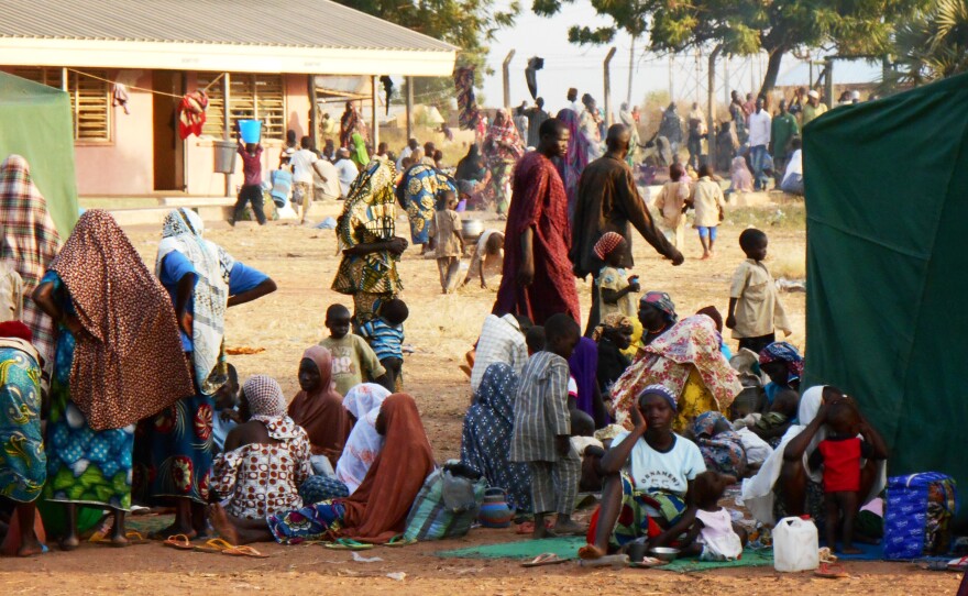 Civilians displaced by Boko Haram sit at a camp near Yola, the capital of northeast Nigeria's Adamawa state.