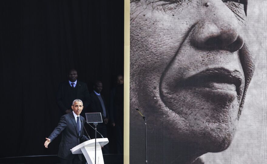 Former President Obama speaks in Johannesburg on Tuesday at the centennial of the Nelson Mandela's birth.