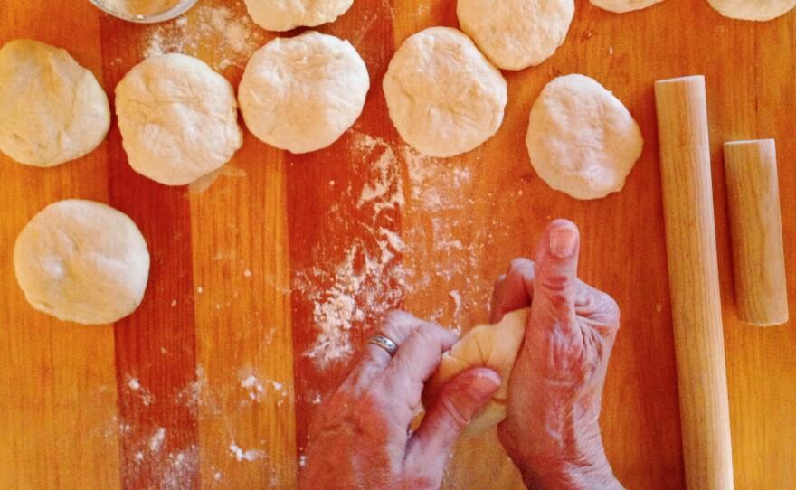 Janet Stein Romero of El Ancon, New Mexico, shapes the dough before rolling out flour tortillas.