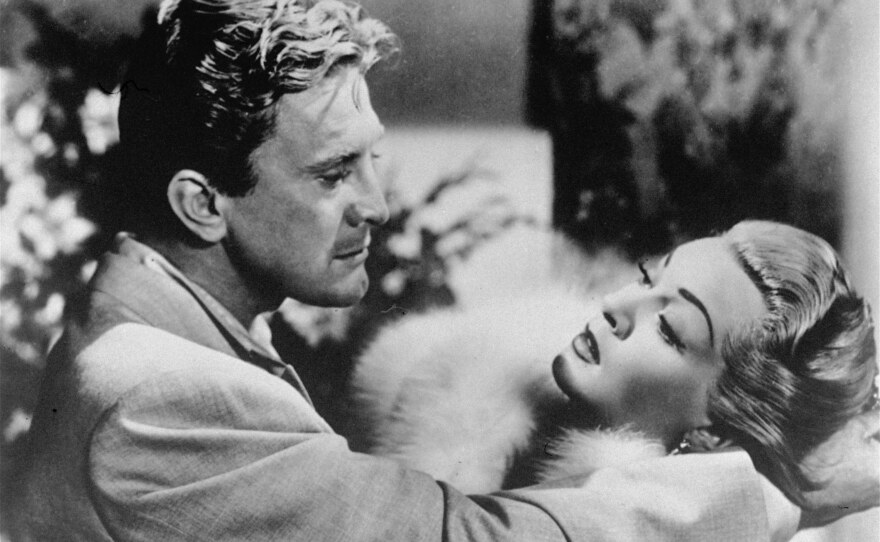 Douglas and Lana Turner dance in a scene from Vincente Minnelli's 1952 film, The Bad and the Beautiful.