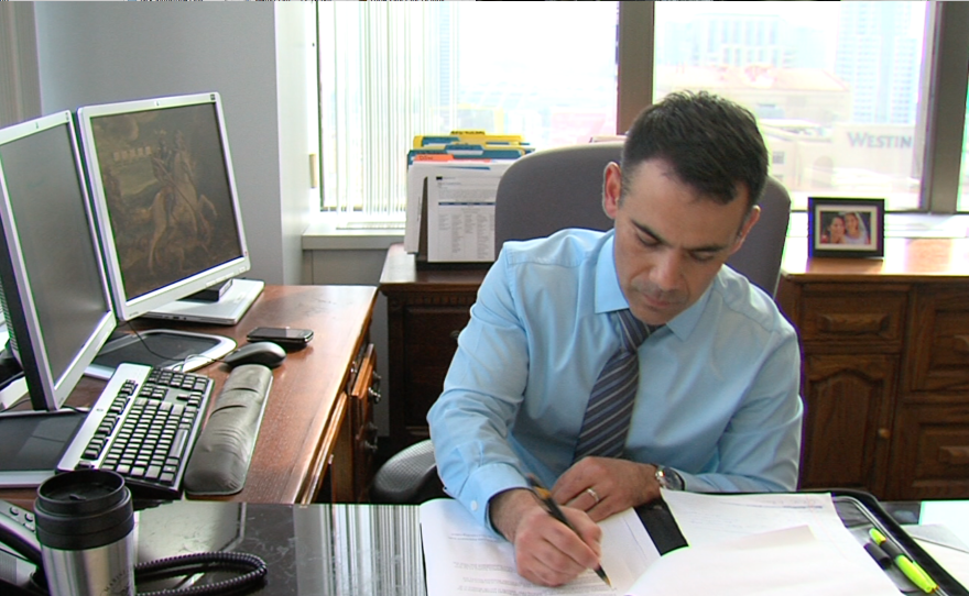 John Valencia, the director of San Diego's Office of Homeland Security, works in his office on Feb. 18, 2015.