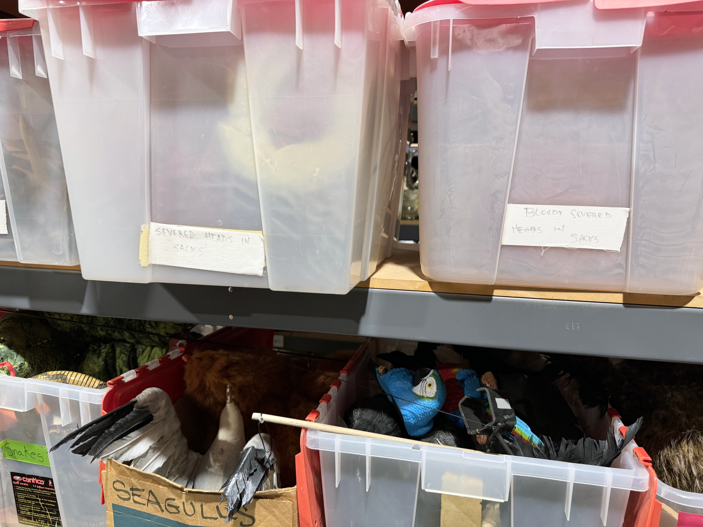 Boxes labeled "severed heads in sacks" and "bloody severed heads in sacks" are seen in the props warehouse at La Jolla Playhouse, March 23, 2026.