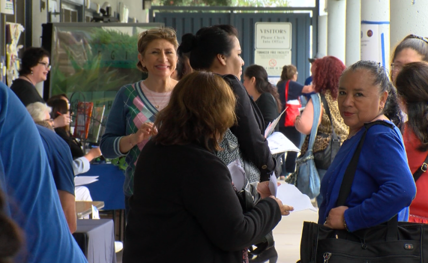 Job seekers and educators attend a job fair at the San Ysidro Adult School, April 27, 2017.