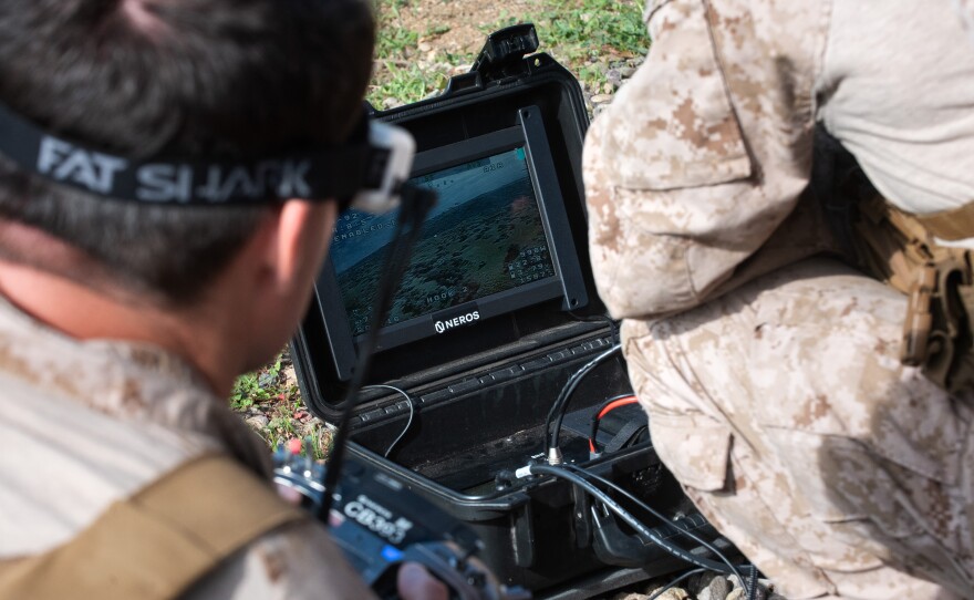 One Marine pilots while another navigates by watching real-time video feed from a Neros Archer drone during training at Camp Pendleton Friday, Jan. 23, 2026.