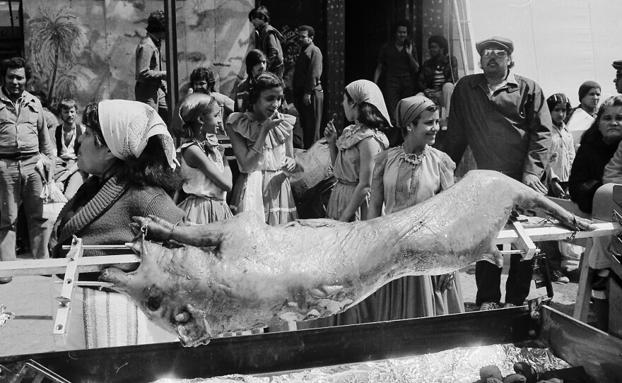 A staged pig roasting in Lower East Side, Manhattan, for the film <em>Oliver's Story</em> in 1978.