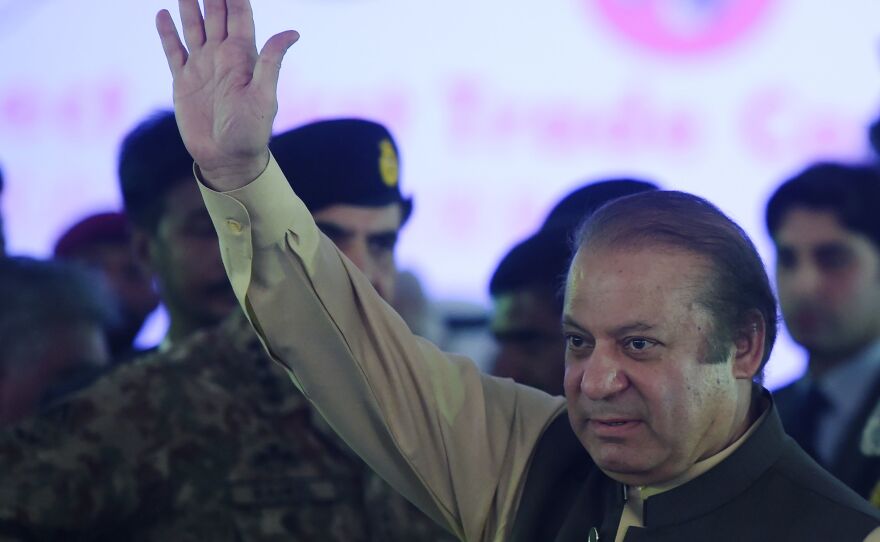 Pakistan's Prime Minister Nawaz Sharif waves as he arrives to attend a ceremony in the Pakistani port of Gwadar on Nov. 13.