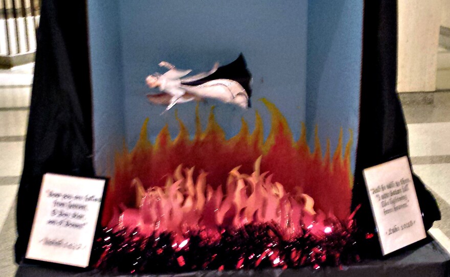 The Satanic Temple holiday display at the Florida Capitol on Monday — before it was vandalized.