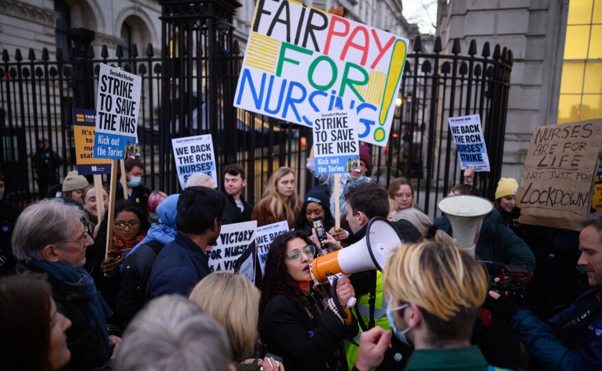 National Health Service workers and supporters gather outside Downing Street to protest during the second day of strike action by NHS nurses on Dec. 20 in London. For the first time in its history, the Royal College of Nursing called its members out on strike in England, Wales and Northern Ireland, over pay and conditions.
