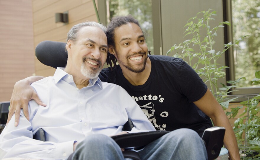 Phil Freelon and his son Pierce Freelon pose for photo in Durham, N.C.