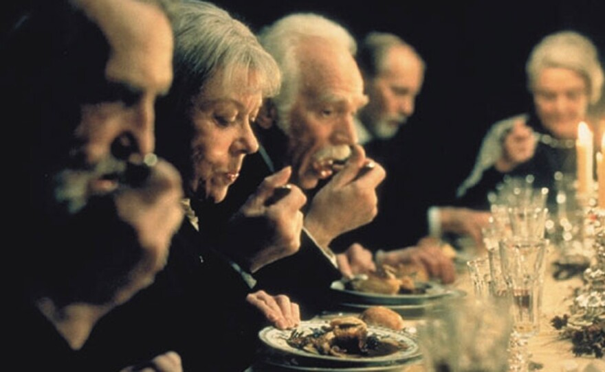 The dinner guests in the midst of transformation in "Babette's Feast."