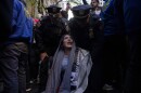 Police detain Nerdeen Kiswani, an organizer of pro-Palestinian demonstration group "Within Our Lifetime" during a protest on Friday, April 12, 2024, in New York.