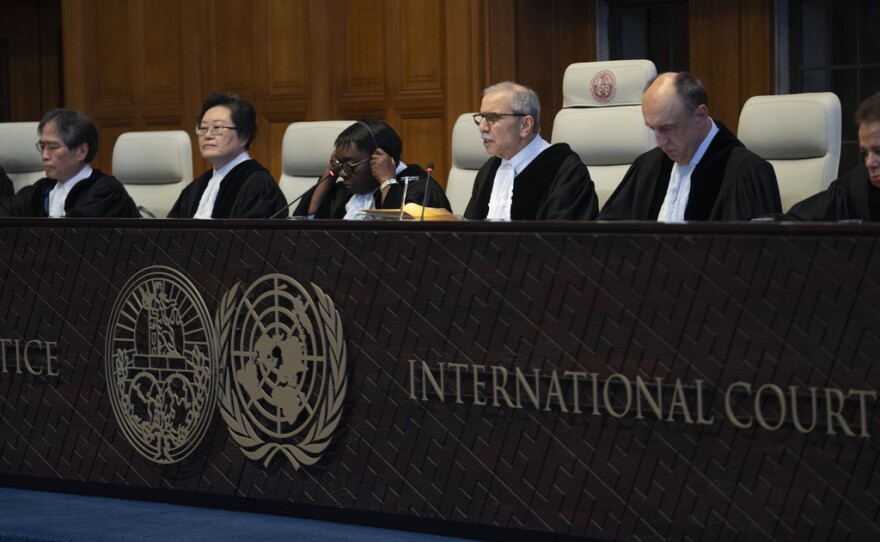 Judge Nawaf Salam, third from right, read the ruling of the International Court of Justice, or World Court, in The Hague, Netherlands, Thursday, May 23, 2024, where Mexico took Ecuador to the United Nations' top court accusing the nation of violating international law by storming into the Mexican embassy in Quito on April 5, and arresting former Ecuador Vice President Jorge Glas, who had been holed up there seeking asylum in Mexico. (AP Photo/Peter Dejong)
