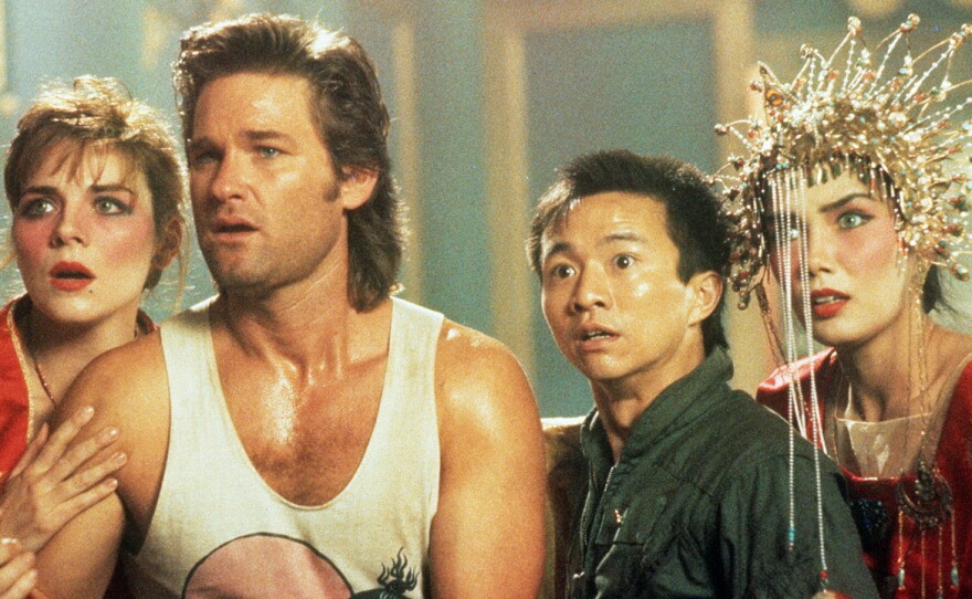Kim Cattrall, Kurt Russell, Dennis Dun, and Suzee Pai in John Carpenter's "Big Trouble in Little China."