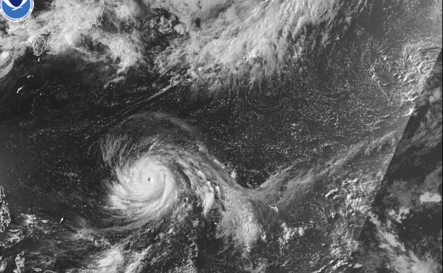 This satellite image from the National Oceanic and Atmospheric Administration shows Typhoon Bavi nearing the U.S. Pacific island territory of Guam on Sunday, July 5, 2026.