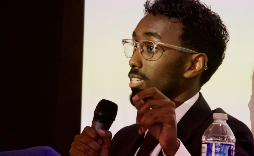 Liban Mohamed won more than 51% of the delegates at the Utah Democratic Party's nominating convention in April, though the primary will decide the final nominee. In this file photo, Mohamed speaks on a panel of candidates running to represent Utah's new Democratic-leaning congressional district in Taylorsville, Utah on March 21.