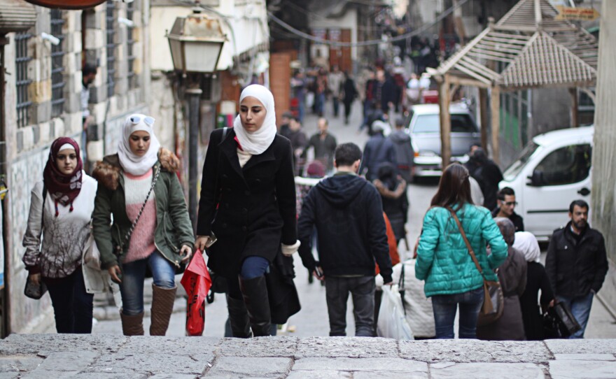 In the Old City, life seems to thrive. But there are constant reminders of the ravages of war — high food prices, roaring generators to supply power and homeless children begging on the streets.