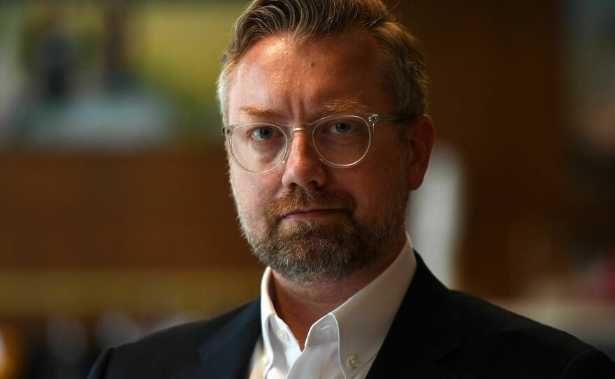 Shein's head of strategic communications, Peter Pernot-Day, poses at Shein's offices in Paris in May. He says of the fashion company: "We're really a different model, a new model."