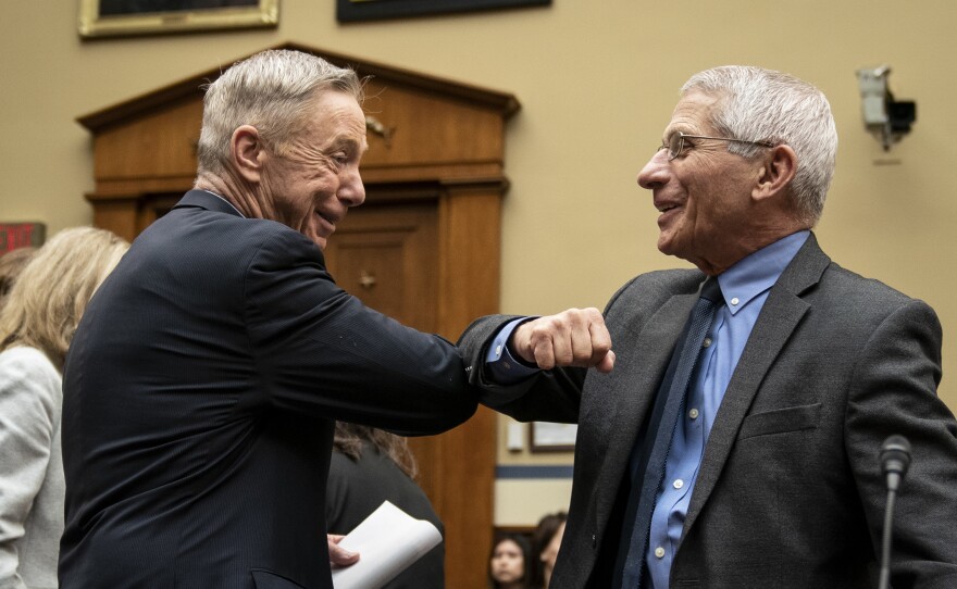 Before there were masks, there were elbow bumps. Rep. Stephen Lynch, D-Mass., and Dr. Anthony Fauci greet each other before a House Oversight And Reform Committee hearing on March 11, 2020.