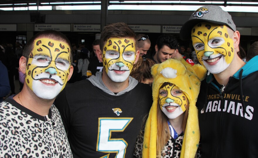 Fans from the English city of Reading don Jacksonville Jaguars onesies to cheer on the team, which has committed to playing games in London through at least 2020.