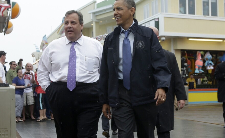 President Obama and New Jersey Gov. Chris Christie walk along the boardwalk in Point Pleasant, N.J., on Tuesday. Obama traveled to New Jersey to join Christie in inspecting and touring the Jersey Shore's recovery efforts from Superstorm Sandy.