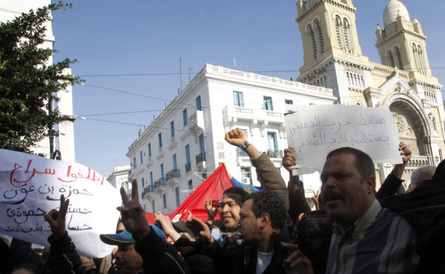 Protesters shouted slogans against former Tunisian President Zine El Abidine Ben Ali during a demonstration Monday in the center of Tunis.