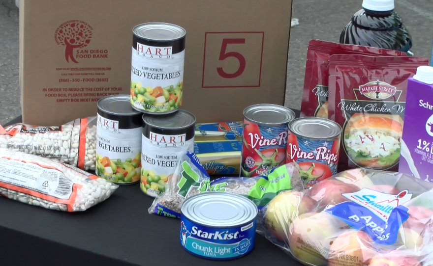 Pictured, a 40-pound box of food including canned goods, fresh fruit, milk and cheese. Boxes like this one were distributed by the San Diego Food Bank through its Senior Food Program. Chula Vista, Calif. Feb. 24, 2023.