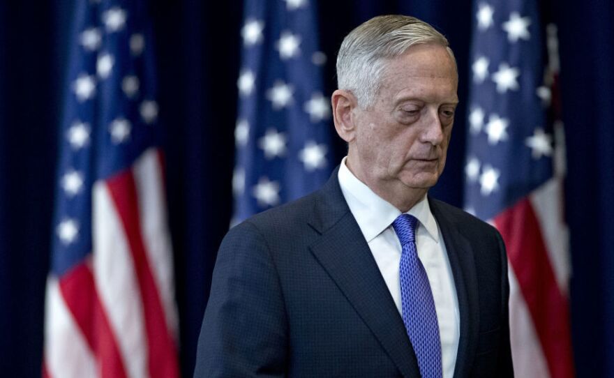 James Mattis, then U.S. secretary of defense, leaves a news conference following a meeting about U.S.-China diplomacy and security at the State Department in Washington, D.C., in June 2017. Mattis' new book, Call Sign Chaos, implies criticism of President Trump without taking direct shots at him.