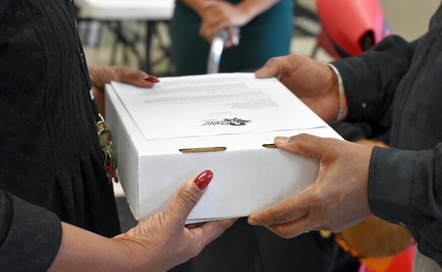 Voting rights groups delivered a petition they said includes more than 600 signatures from three precincts in opposition to Lincoln County's plans to drastically reduce the number of polling places in the county.