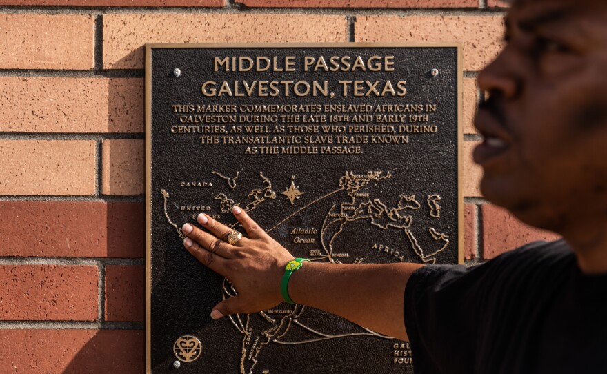 Sam Collins talks about a plaque commemorating the Middle Passage.