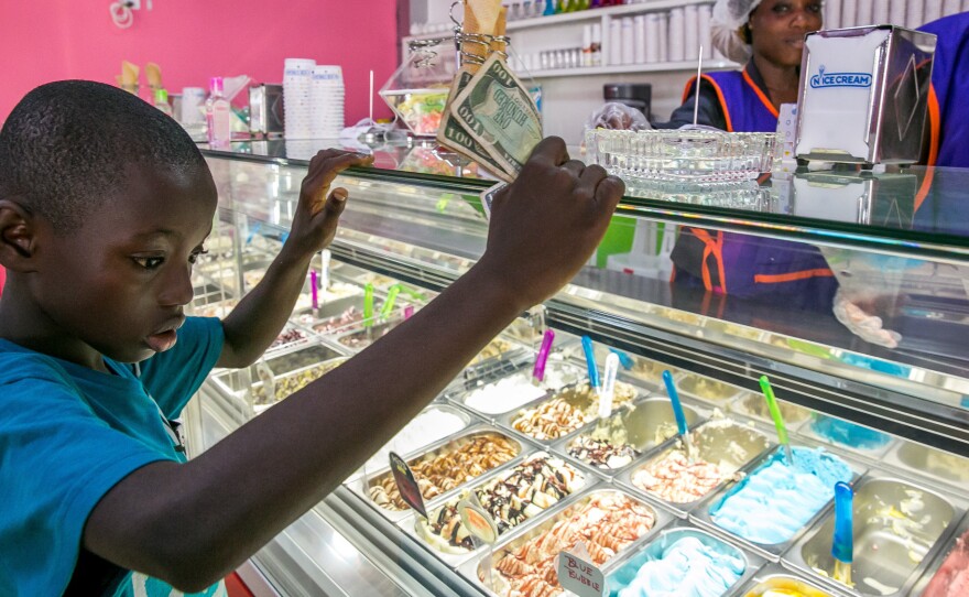 A young boy eyes his options at Nice Cream.