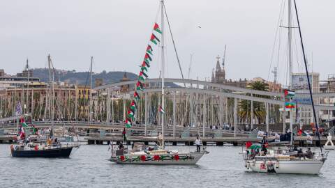 Boats carrying activists and humanitarian aid for Palestinians in Gaza reposition in the port during a symbolic send-off as part of the Global Sumud Flotilla, in Barcelona, Spain, Sunday, April 12, 2026.