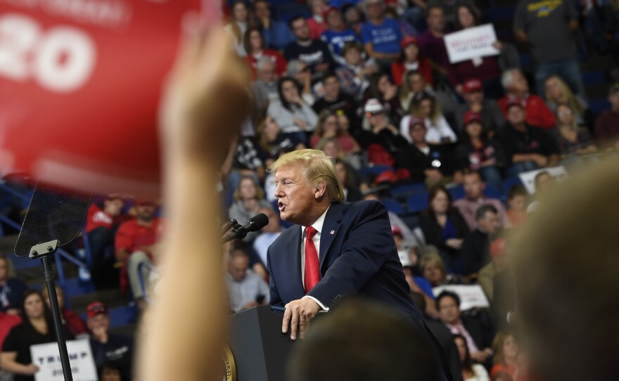President Trump speaks during a campaign rally in Lexington, Ky., Monday. His efforts don't appear to have been enough to carry incumbent GOP Gov. Matt Bevin over the finish line.