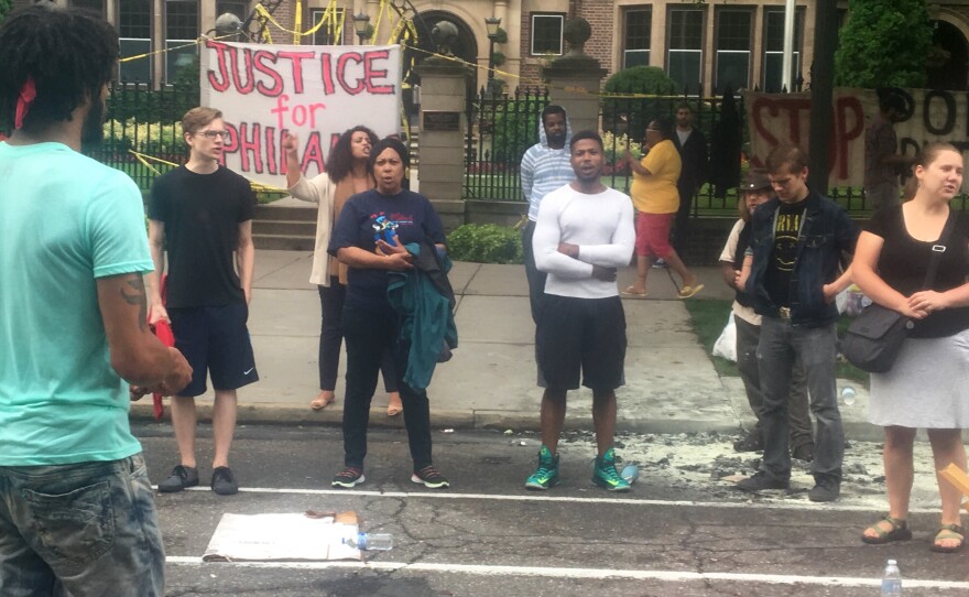 About 200 people gathered outside the Minnesota Governor's Residence in St. Paul on Thursday, protesting the fatal shooting of a man by a police officer. Philando Castile was shot in a car Wednesday night in the St. Paul suburb of Falcon Heights.