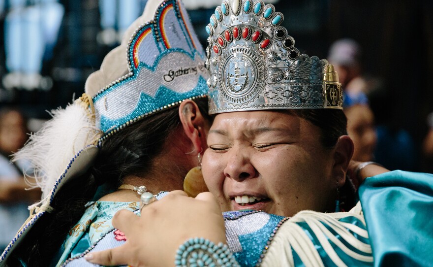 Montoya (right) hugs 2018-2019 Miss Indian World Taylor Susan after the coronation ceremony.