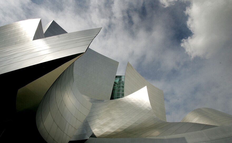 Light reflects off the shimmering stainless steel panels on Gehry's Walt Disney Concert Hall in Los Angeles.