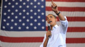 President Obama speaks during a town hall meeting on health insurance Friday in a hangar at Gallatin Field Airport in Belgrade, Mont.