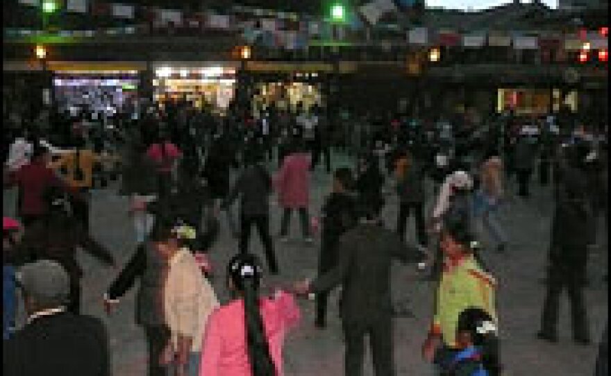 Residents of Zhongdian — now renamed Shangri-La — dance every night in the square of the old town. The tourist traffic has revitalised the area's traditional culture. As Director of Tourism Awa puts it, "Now we see that our own traditions are actually worth money."
