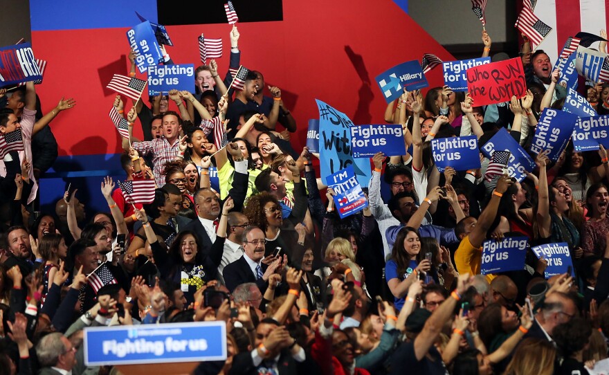 Supporters cheer Tuesday in New York City as Democratic presidential candidate Hillary Clinton is called the winner of the New York primary.