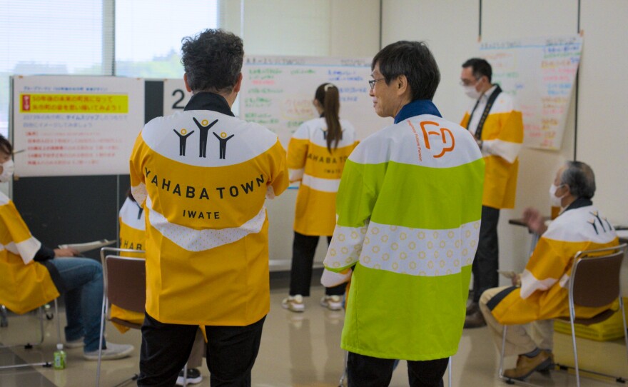 Ari Wallach interviewing Dr. Tatsuyoshi Saijō.